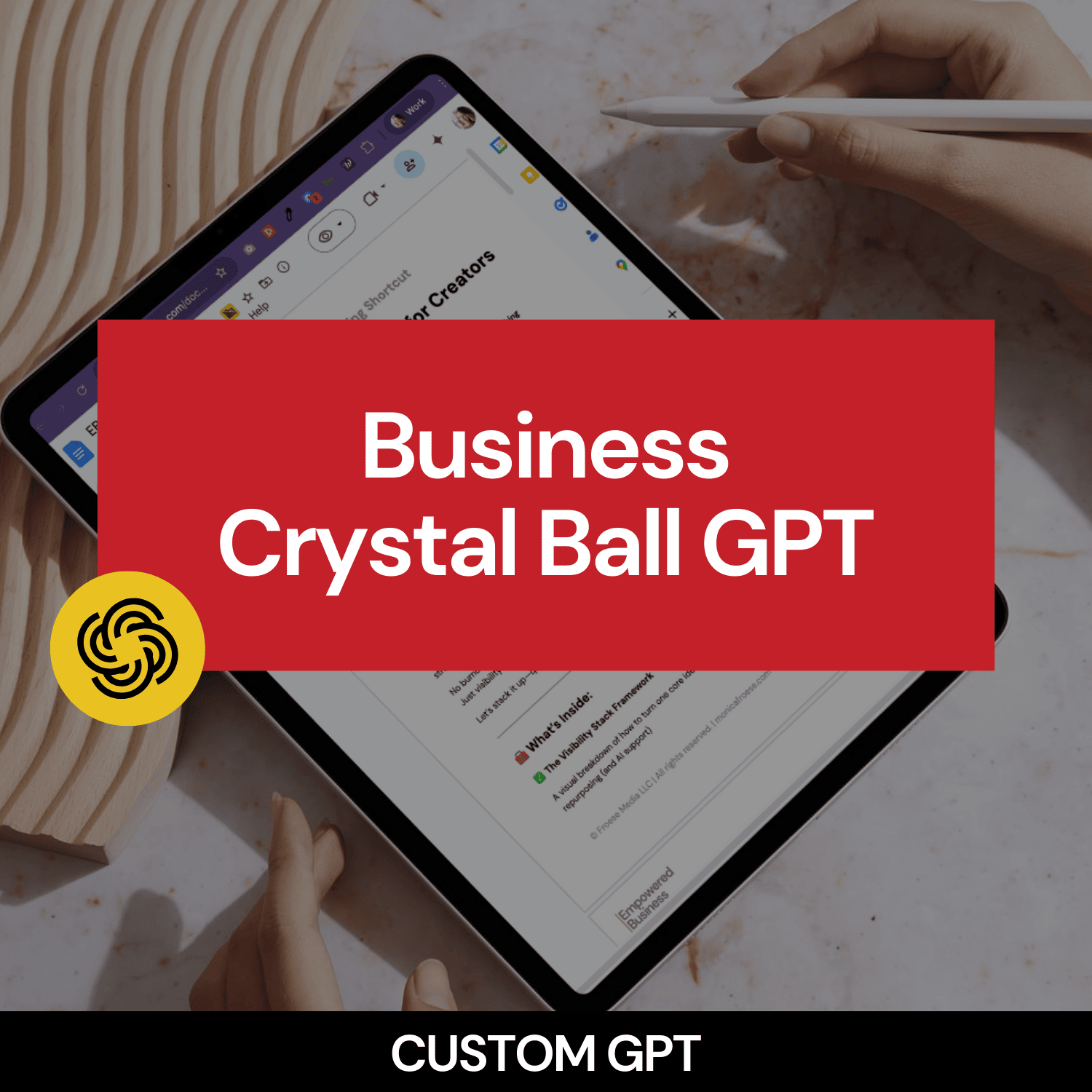 Tablet with 'Business Crystal Ball GPT' text on a blurred background