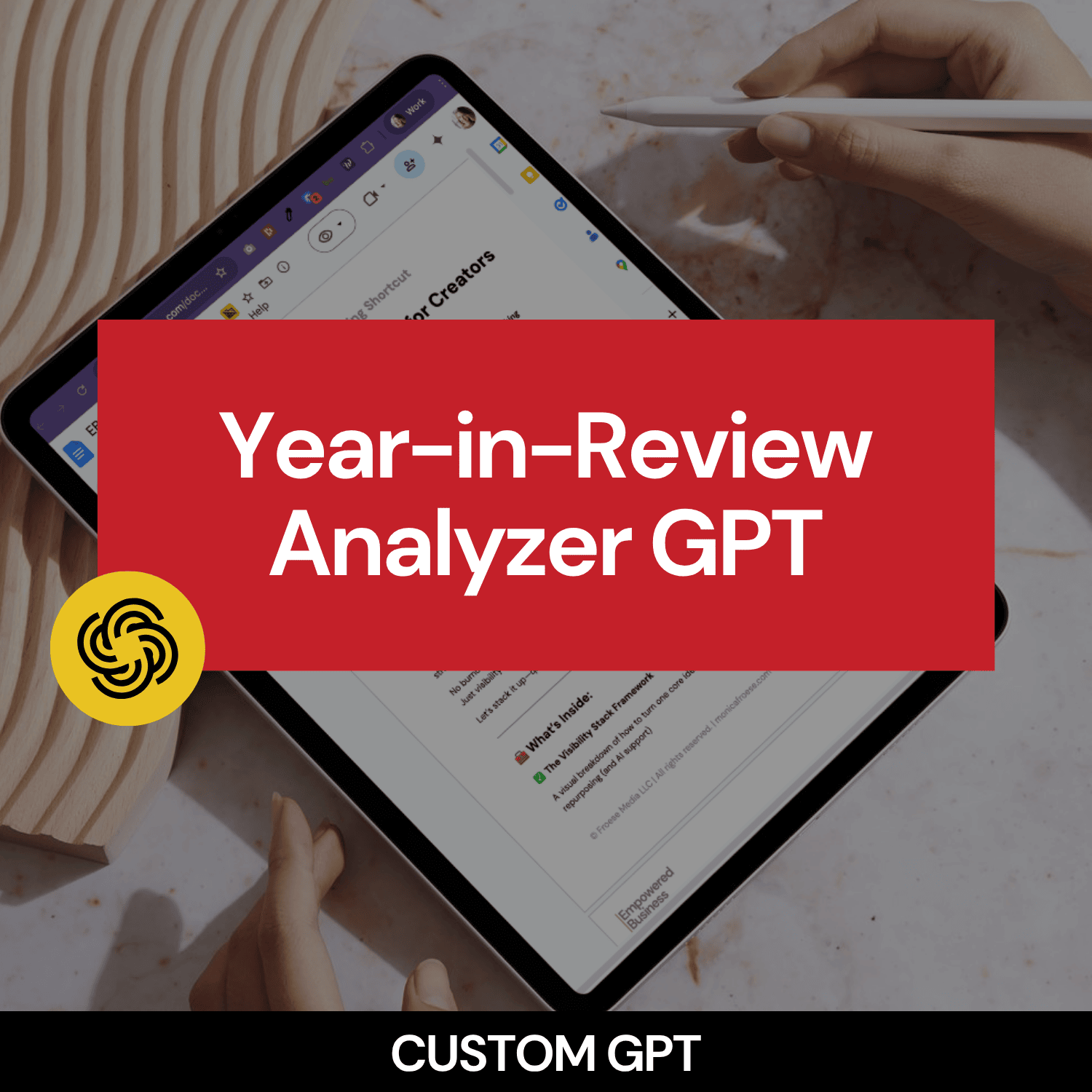 Tablet with 'Year-in-Review Analyzer GPT' text on a blurred background